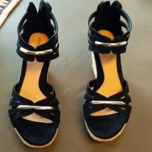 Black and beige sandals, 3 inch platform, zipper back, silver metal deco on top.